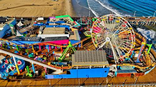 amusement park Ferris wheel near body of water during daytime 380 santa monica pier